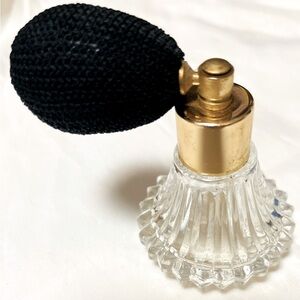 Crystal vintage perfume bottle with hand pump. Very pretty!